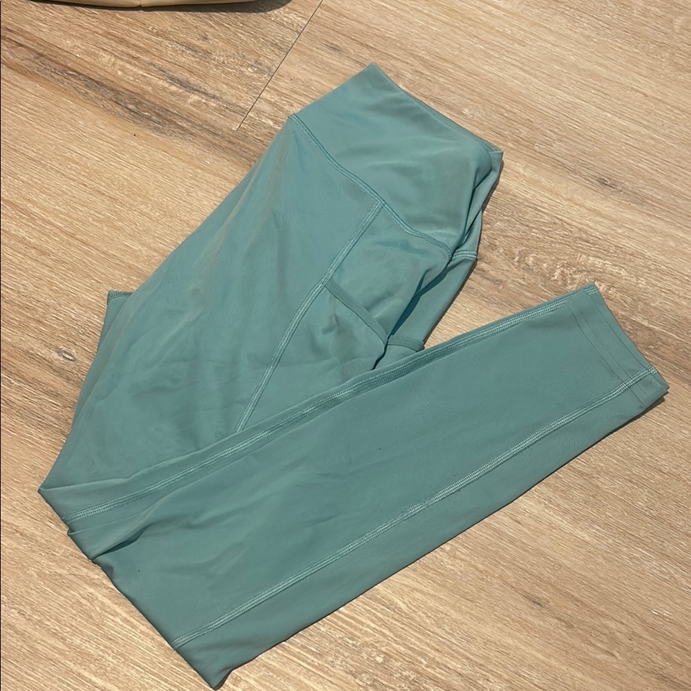 Gymshark Teal Leggings with two pockets